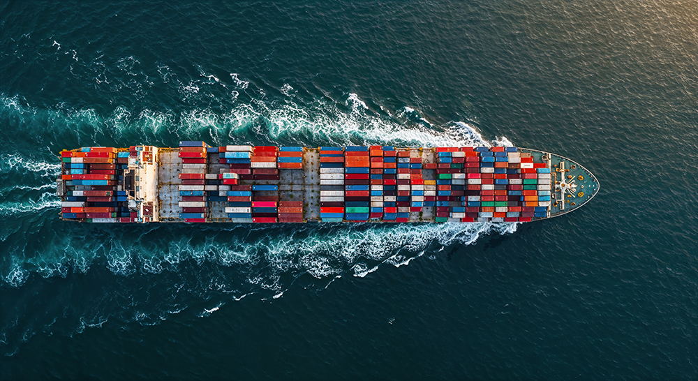 cargo-ship-sailing-ocean - small